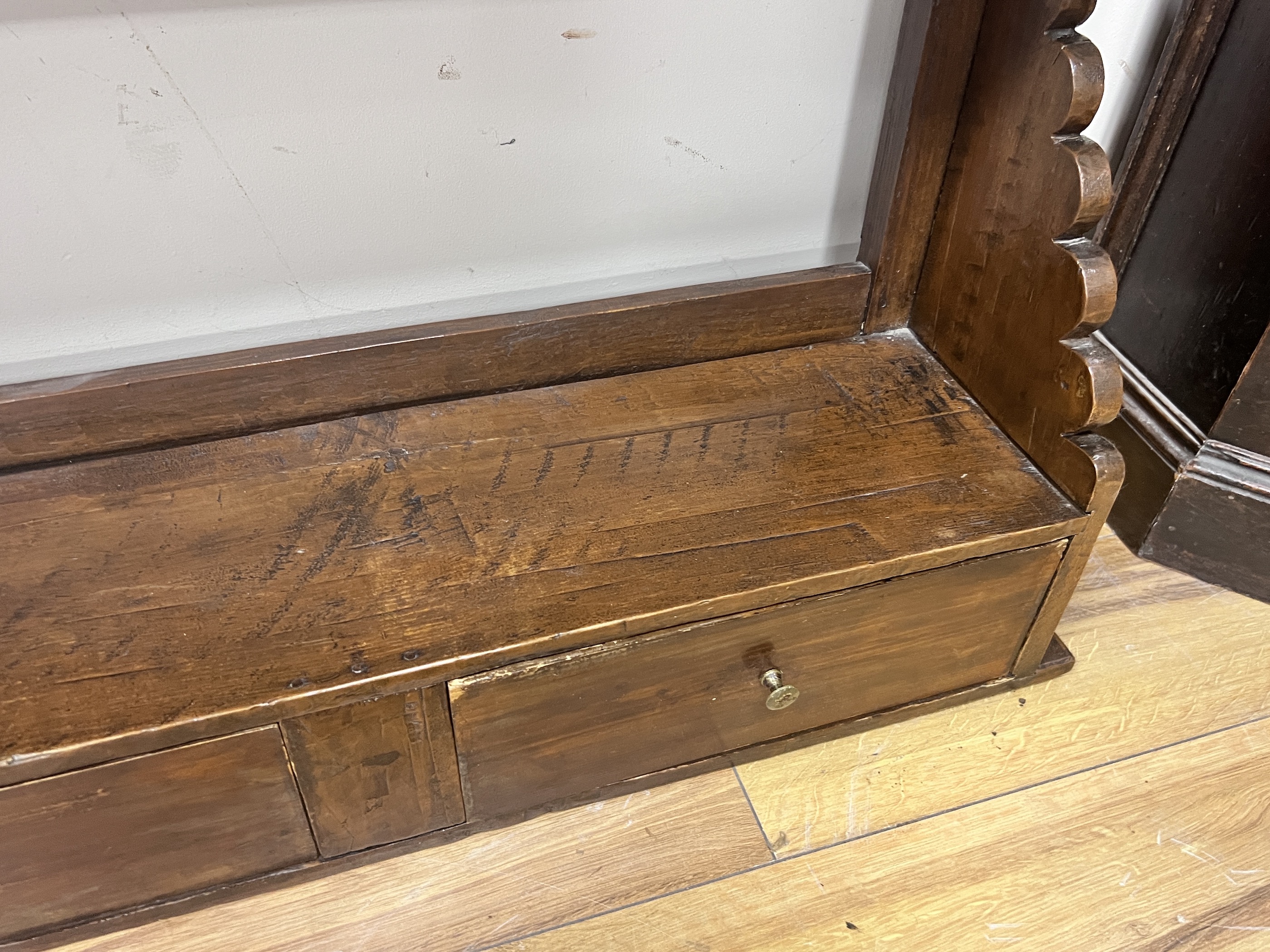 A provincial pine four tier hanging wall bracket, width 85cm, depth 21cm, height 102cm